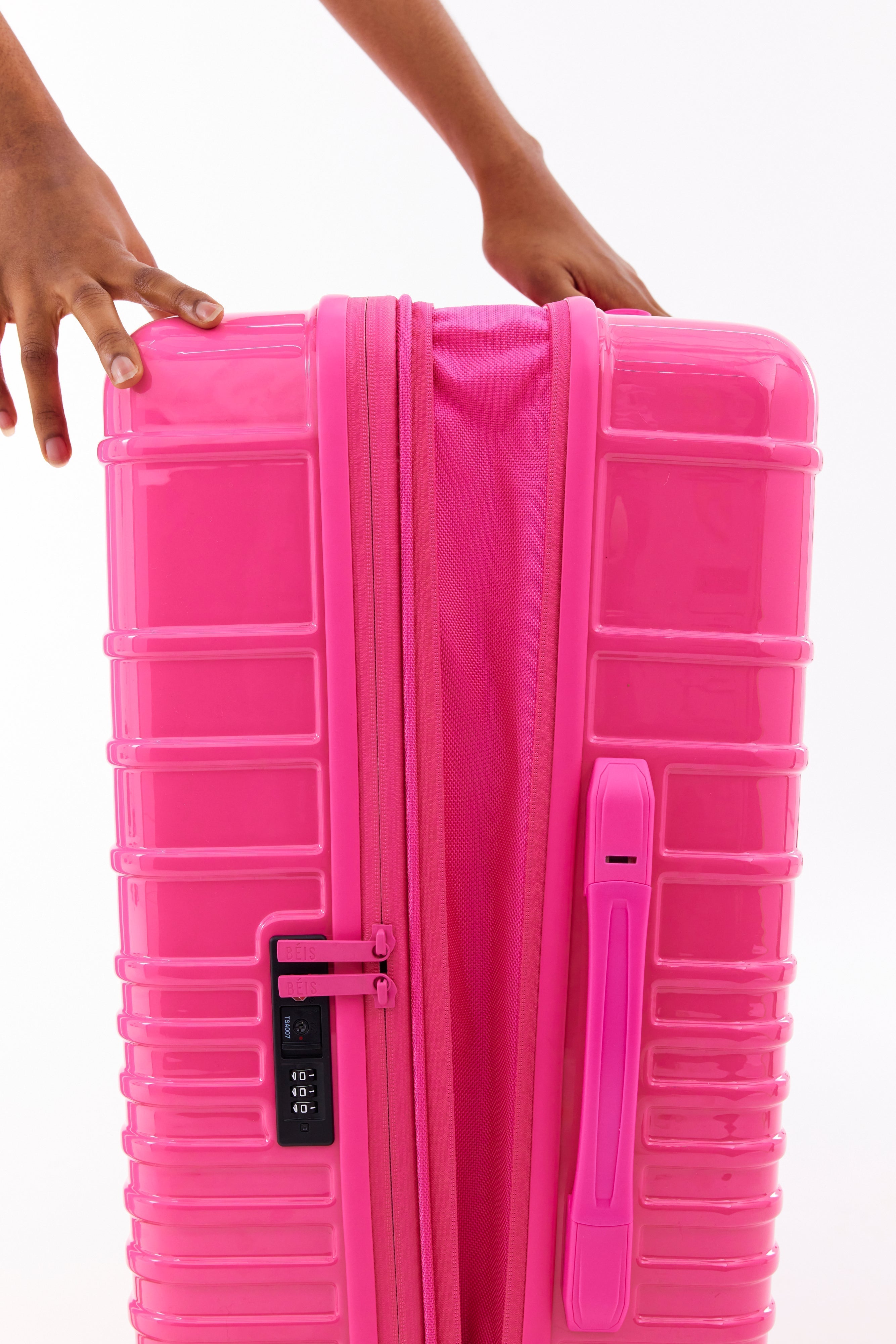 The Medium Check-In Roller in Barbie? Pink